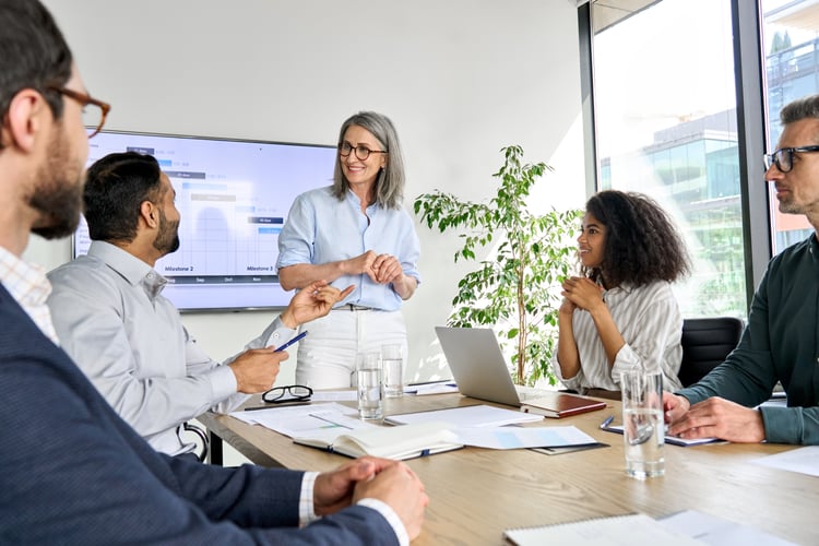 Woman leading team meeting in a conference room